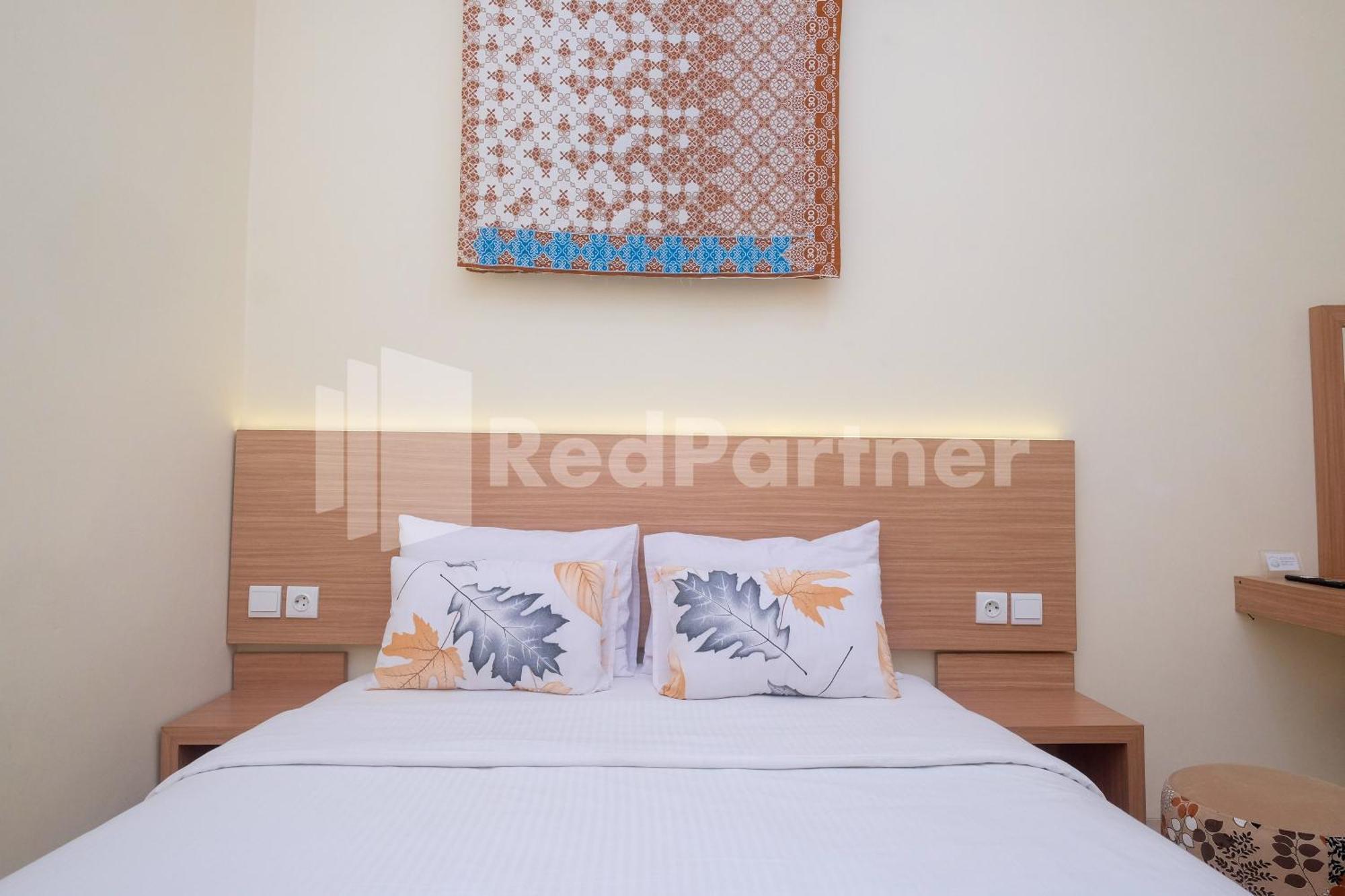 Отель Ndliman House Near Ugm Jogja Mitra Reddoorz Kejayan Экстерьер фото