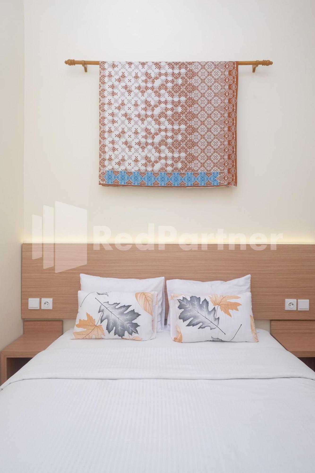 Отель Ndliman House Near Ugm Jogja Mitra Reddoorz Kejayan Экстерьер фото